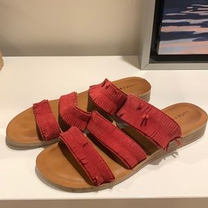 Lucky Brand size 8. Suede red straps. Leather sole.